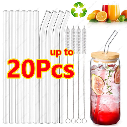 Set of clear straws with a glass drink container and fruit background