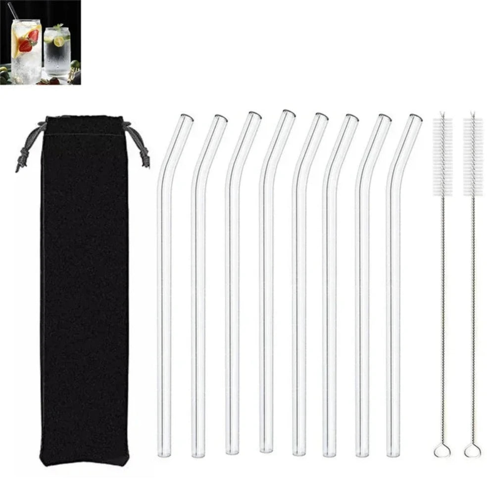 Set of 8 clear glass straws with a black pouch and cleaning brush on a white background.
